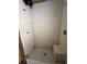 A shower stall with a built-in seat at 17025 Dalberg Dr, Spring Hill, FL 34610