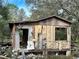 Severely damaged house requiring extensive repairs or demolition at 17025 Dalberg Dr, Spring Hill, FL 34610