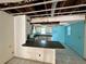 Renovation project: Kitchen with damaged walls and ceiling, awaiting updates at 17025 Dalberg Dr, Spring Hill, FL 34610