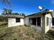 Ranch-style home with a large window and satellite dish at 17025 Dalberg Dr, Spring Hill, FL 34610