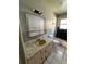 Dated bathroom vanity and sink; requires a complete renovation at 17025 Dalberg Dr, Spring Hill, FL 34610