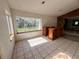 Living room with tiled floor and a bar at 17025 Dalberg Dr, Spring Hill, FL 34610