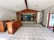 Large living room with high ceilings and a bar area, currently under renovation at 17025 Dalberg Dr, Spring Hill, FL 34610