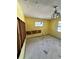 Needs renovation: bedroom with damaged walls and floors at 17025 Dalberg Dr, Spring Hill, FL 34610