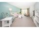 Spacious living area with ample natural light and comfortable furnishings at 1450 Heather Ridge Blvd # 107, Dunedin, FL 34698