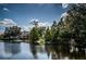 Scenic waterfront view with lush vegetation at 1450 Heather Ridge Blvd # 107, Dunedin, FL 34698