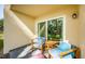 Relaxing patio with seating area, perfect for outdoor enjoyment at 1450 Heather Ridge Blvd # 107, Dunedin, FL 34698