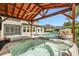 Enjoy this hot tub with pool views at 4807 Lago Vista Cir, Land O Lakes, FL 34639