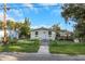 Charming single story home with a well maintained lawn at 906 Jurgens St, Clearwater, FL 33755