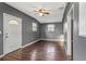 Spacious living room with hardwood floors and ceiling fan at 906 Jurgens St, Clearwater, FL 33755