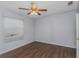 Charming bedroom with wood flooring and a ceiling fan at 906 Jurgens St, Clearwater, FL 33755