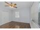 Spacious bedroom with hardwood floors and window coverings at 906 Jurgens St, Clearwater, FL 33755