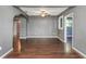 Living room featuring hardwood floors and a ceiling fan at 906 Jurgens St, Clearwater, FL 33755