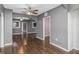 Open concept living room with hardwood floors and fan at 906 Jurgens St, Clearwater, FL 33755