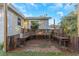 Rustic wooden patio with built-in seating, perfect for outdoor relaxation at 906 Jurgens St, Clearwater, FL 33755