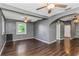 Hardwood floors and ceiling fan in this open living area at 906 Jurgens St, Clearwater, FL 33755