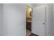 Clean bathroom with dark brown vanity and tiled flooring at 906 Jurgens St, Clearwater, FL 33755