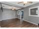 Open living area with hardwood floors and ceiling fan at 906 Jurgens St, Clearwater, FL 33755