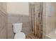 Bathroom with shower and tile surround at 906 Jurgens St, Clearwater, FL 33755