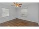 Bright bedroom with wood flooring, ceiling fan, and window blinds at 906 Jurgens St, Clearwater, FL 33755