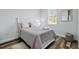 Cozy bedroom with neutral tones and decor at 16451 Strauss Ave, Port Charlotte, FL 33954