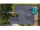 Bird's-eye view of house, highlighting the roofline and pool at 15212 Kestrelrise Dr, Lithia, FL 33547
