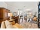 Open living room with hardwood floors and views of the dining and entry areas at 15212 Kestrelrise Dr, Lithia, FL 33547