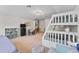 Large bedroom with a bunk bed, trundle, and plenty of storage at 15212 Kestrelrise Dr, Lithia, FL 33547