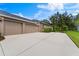 Three car garage with spacious driveway at 15212 Kestrelrise Dr, Lithia, FL 33547