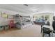 Spacious bedroom with bunk bed, trundle, and ample floor space at 15212 Kestrelrise Dr, Lithia, FL 33547