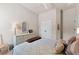 Spacious bedroom with double bed, dresser, and large closet at 15212 Kestrelrise Dr, Lithia, FL 33547