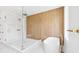 Modern bathroom with glass shower, soaking tub, and gold accents, offering a luxurious spa-like experience at 4625 W El Prado Blvd, Tampa, FL 33629