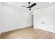 Bright bedroom with a modern ceiling fan, wood flooring and double closets at 4625 W El Prado Blvd, Tampa, FL 33629