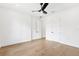 Bright bedroom with a modern ceiling fan, wood flooring and double closets at 4625 W El Prado Blvd, Tampa, FL 33629