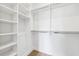 Walk-in closet with custom shelving and ample space for storage and organization at 4625 W El Prado Blvd, Tampa, FL 33629