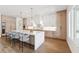 Spacious kitchen featuring a central island, modern appliances, and a view of the outdoors at 4625 W El Prado Blvd, Tampa, FL 33629