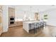 Well-lit kitchen features a large island with seating, double ovens, and bright finishes at 4625 W El Prado Blvd, Tampa, FL 33629
