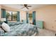 Guest bedroom with twin beds and ceiling fan at 12300 Vonn Rd # 7101, Largo, FL 33774