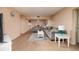 Living room with sofas, a coffee table, and wood-look floors at 12300 Vonn Rd # 7101, Largo, FL 33774