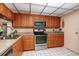 Updated kitchen with stainless steel appliances and granite countertops at 12300 Vonn Rd # 7101, Largo, FL 33774