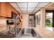 Modern kitchen sink and faucet with granite countertop at 12300 Vonn Rd # 7101, Largo, FL 33774