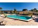 Community pool with surrounding patio at 12300 Vonn Rd # 7101, Largo, FL 33774