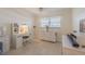 Home office with built-in cabinetry and desk, perfect for working from home at 5501 80Th N St # 206, St Petersburg, FL 33709