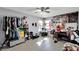 Bright bedroom with tiled floors, ample closet space, and a large window at 11109 Sumner Rd, Wimauma, FL 33598