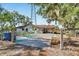 Single story house with carport and gated entrance at 11109 Sumner Rd, Wimauma, FL 33598