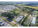 Aerial view showing a large lot with a house and surrounding farmland at 11109 Sumner Rd, Wimauma, FL 33598