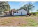 Backyard view of the home's side elevation at 11109 Sumner Rd, Wimauma, FL 33598