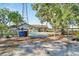 Single story house with carport and gated entrance at 11109 Sumner Rd, Wimauma, FL 33598