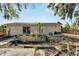 Small house exterior with garden at 11109 Sumner Rd, Wimauma, FL 33598