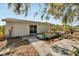 House exterior with patio and garden at 11109 Sumner Rd, Wimauma, FL 33598